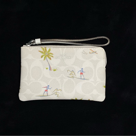 Coach Handbags - Coach Cream Wristlet with Tropical Design